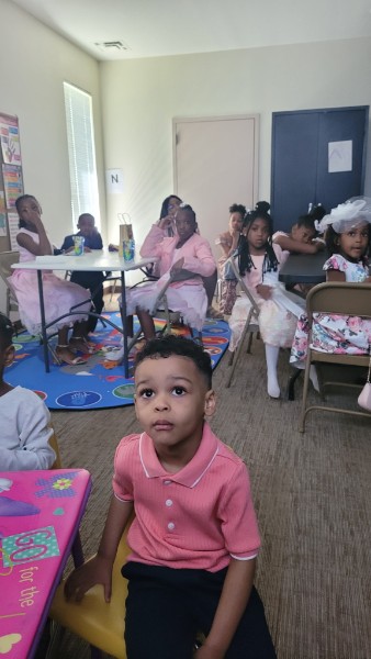Children gathered during a youth ministry classroom activity